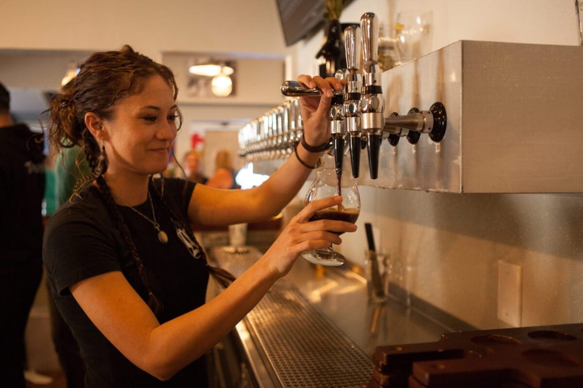 Pouring beer at the Growler
